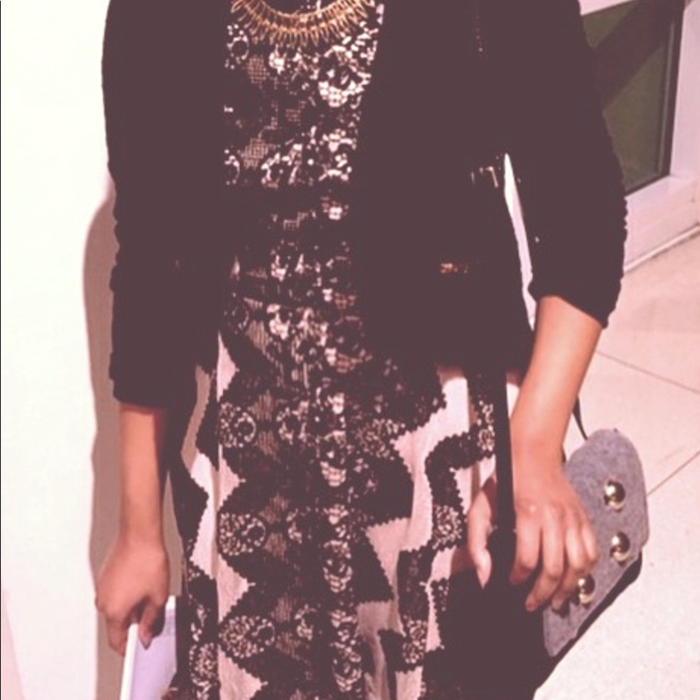 Pink and black lace dress.